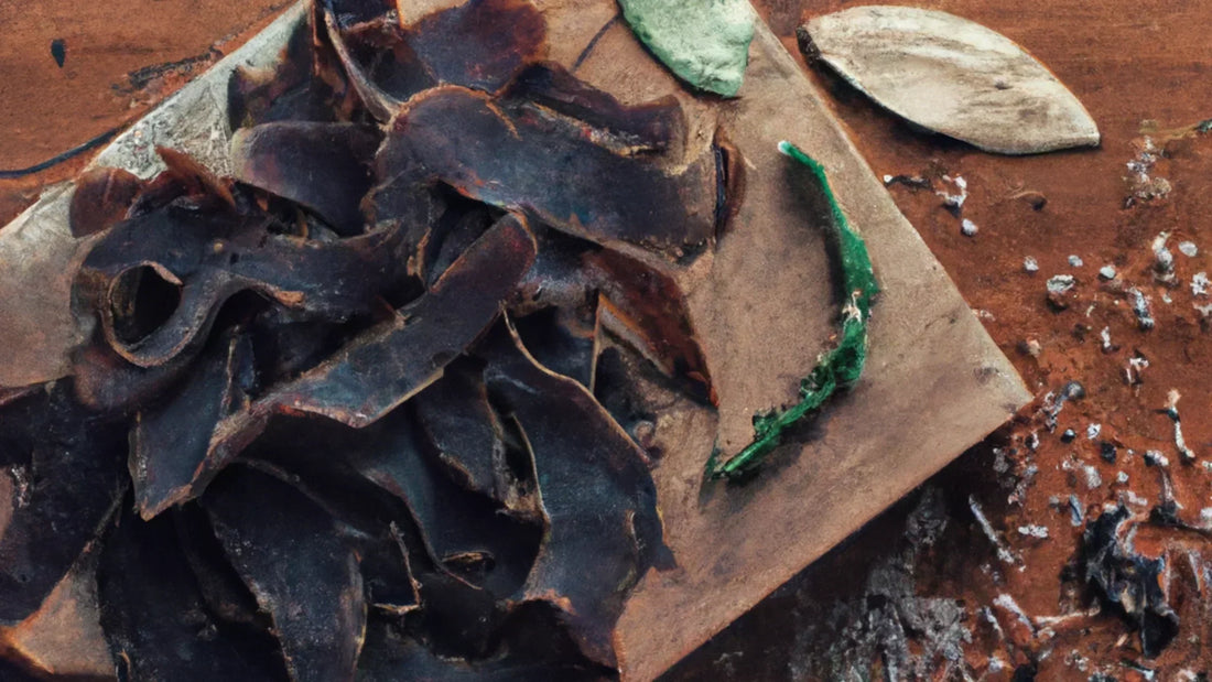 Sliced biltong on a wooden chopping board, showing its dark colour and dried texture.