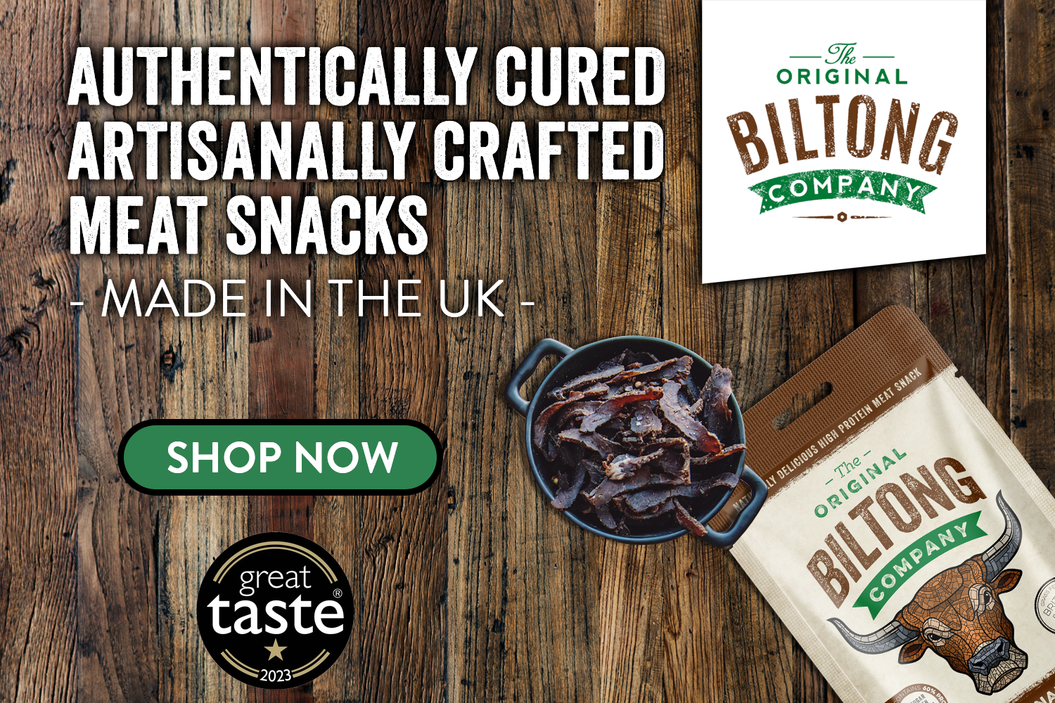 Authentically cured, artisanally crafted meat snacks, made in the UK. A bag of biltong and a bowl of sliced biltong on a wooden table, with a Great Taste award badge.